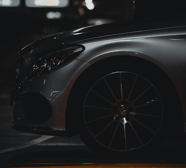 Silver car at night